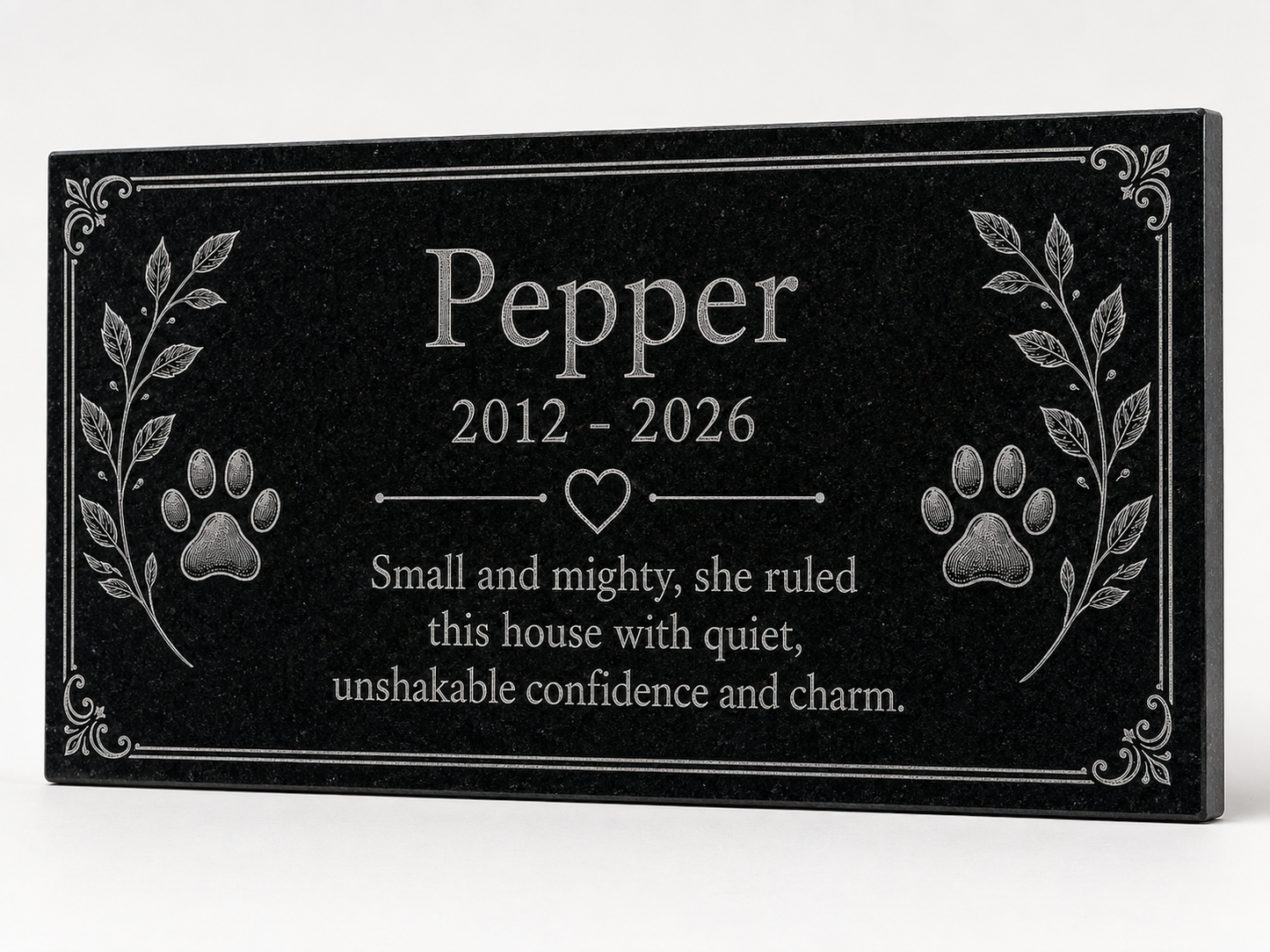 Cat memorial stone with engraved paw prints and heart — ADFSTONE
