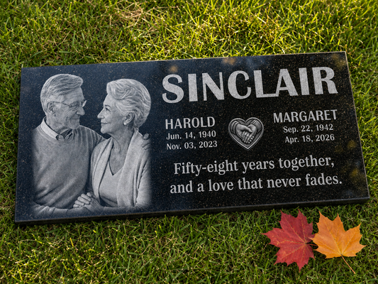 Couple memorial stone with two engraved portraits and joined hearts — ADFSTONE