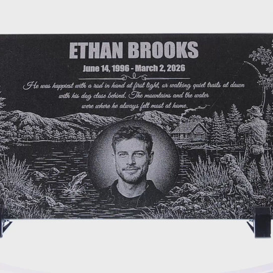 Video of a fisherman memorial stone with engraved lakeside scene — ADFSTONE