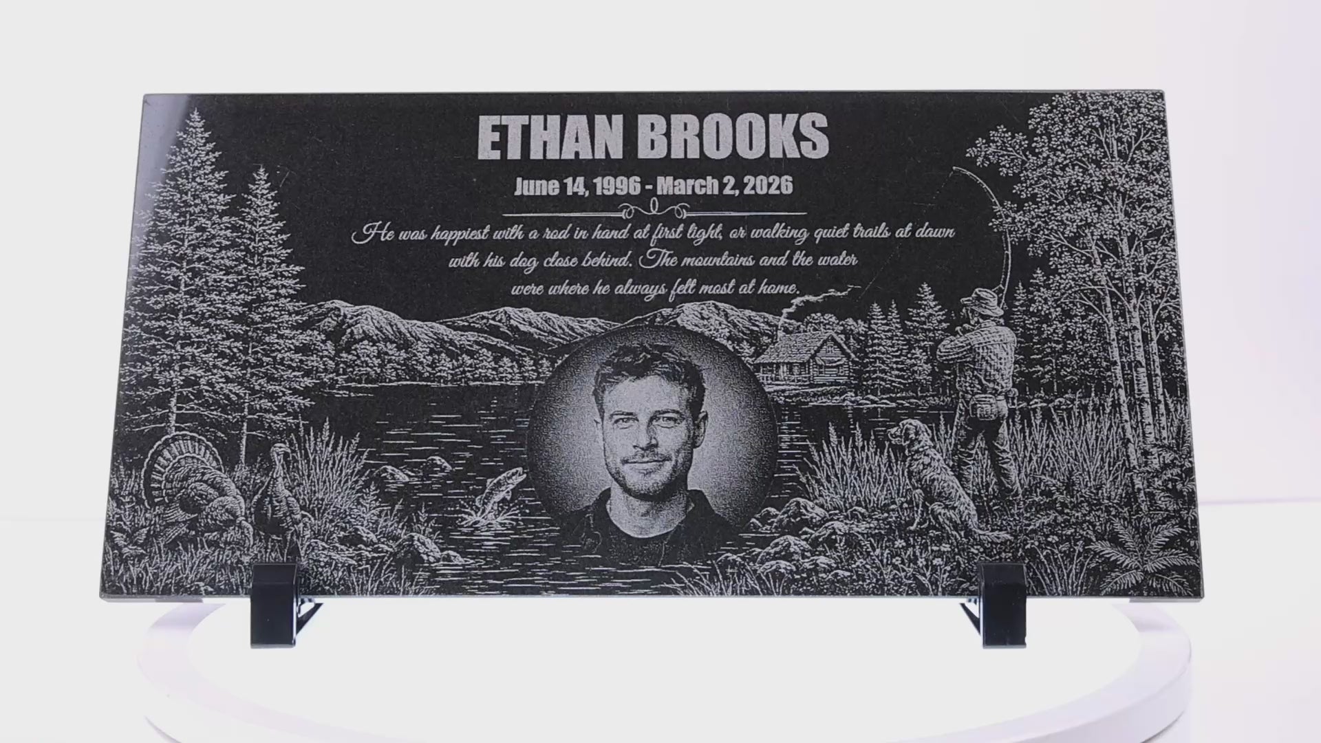 Video of a fisherman memorial stone with engraved lakeside scene — ADFSTONE