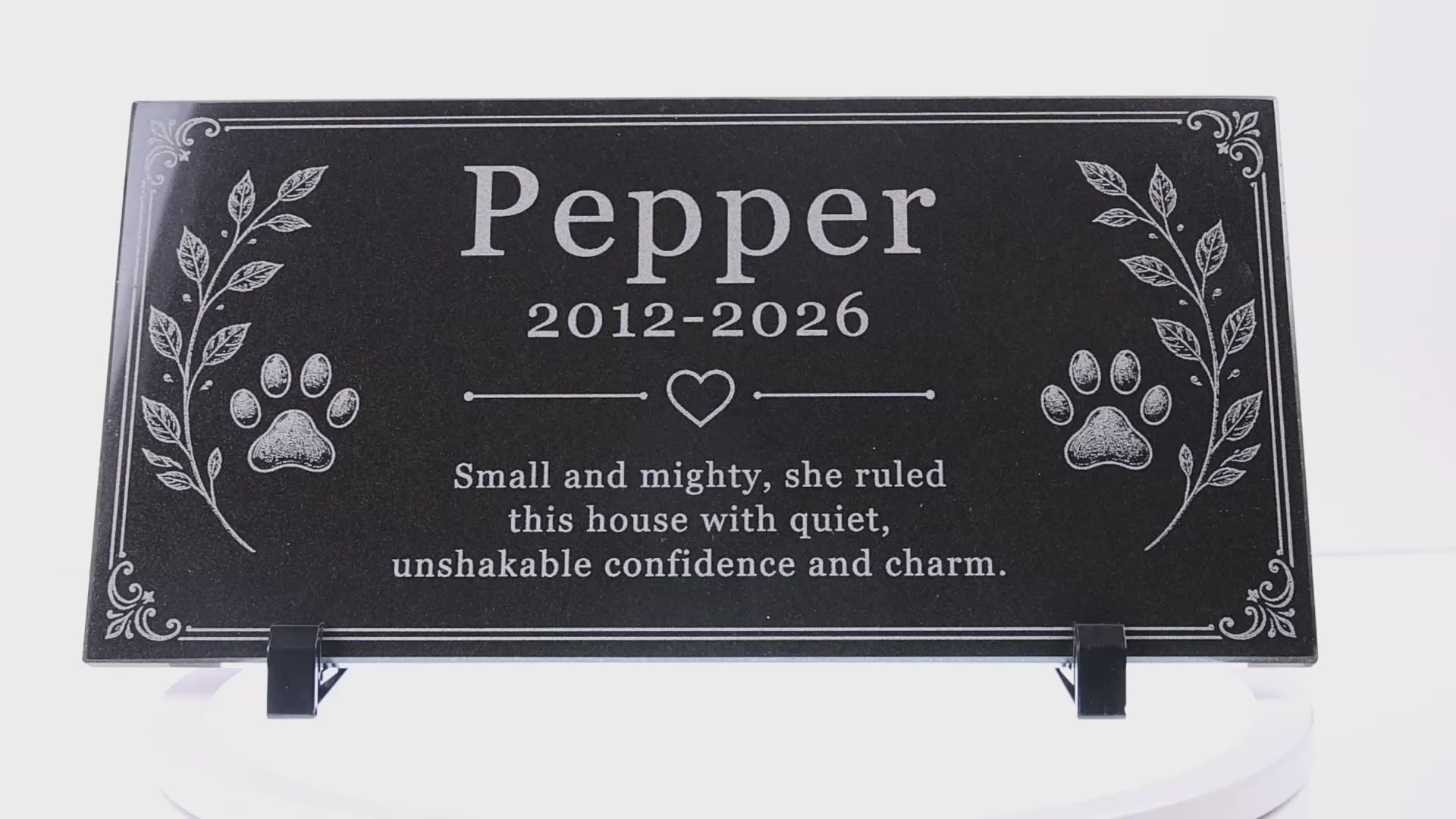 Video of a cat memorial stone with engraved paw prints and heart — ADFSTONE