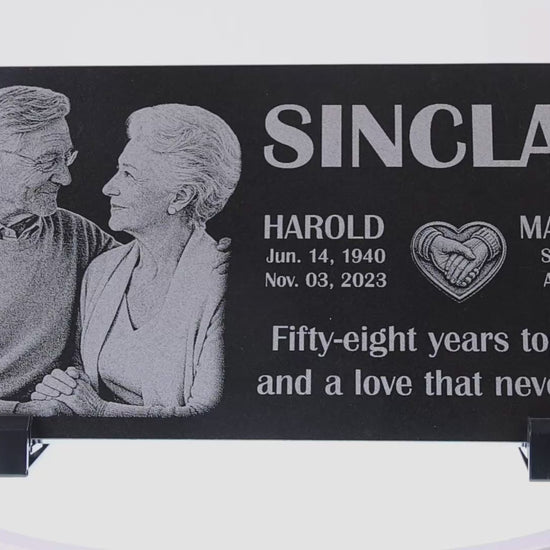Video of a couple memorial stone with two engraved portraits — ADFSTONE